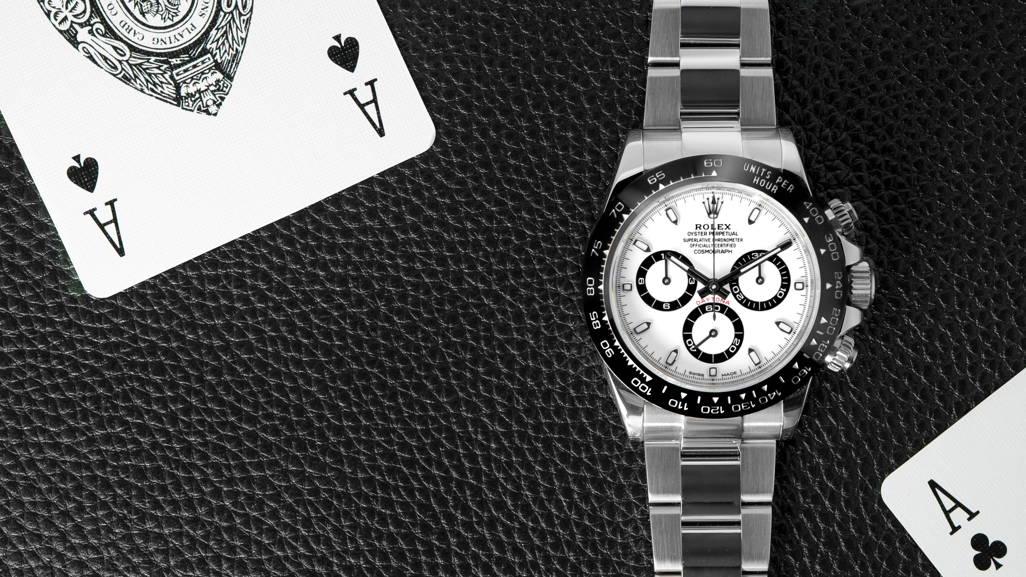 Rolex Daytona on leather with playing cards