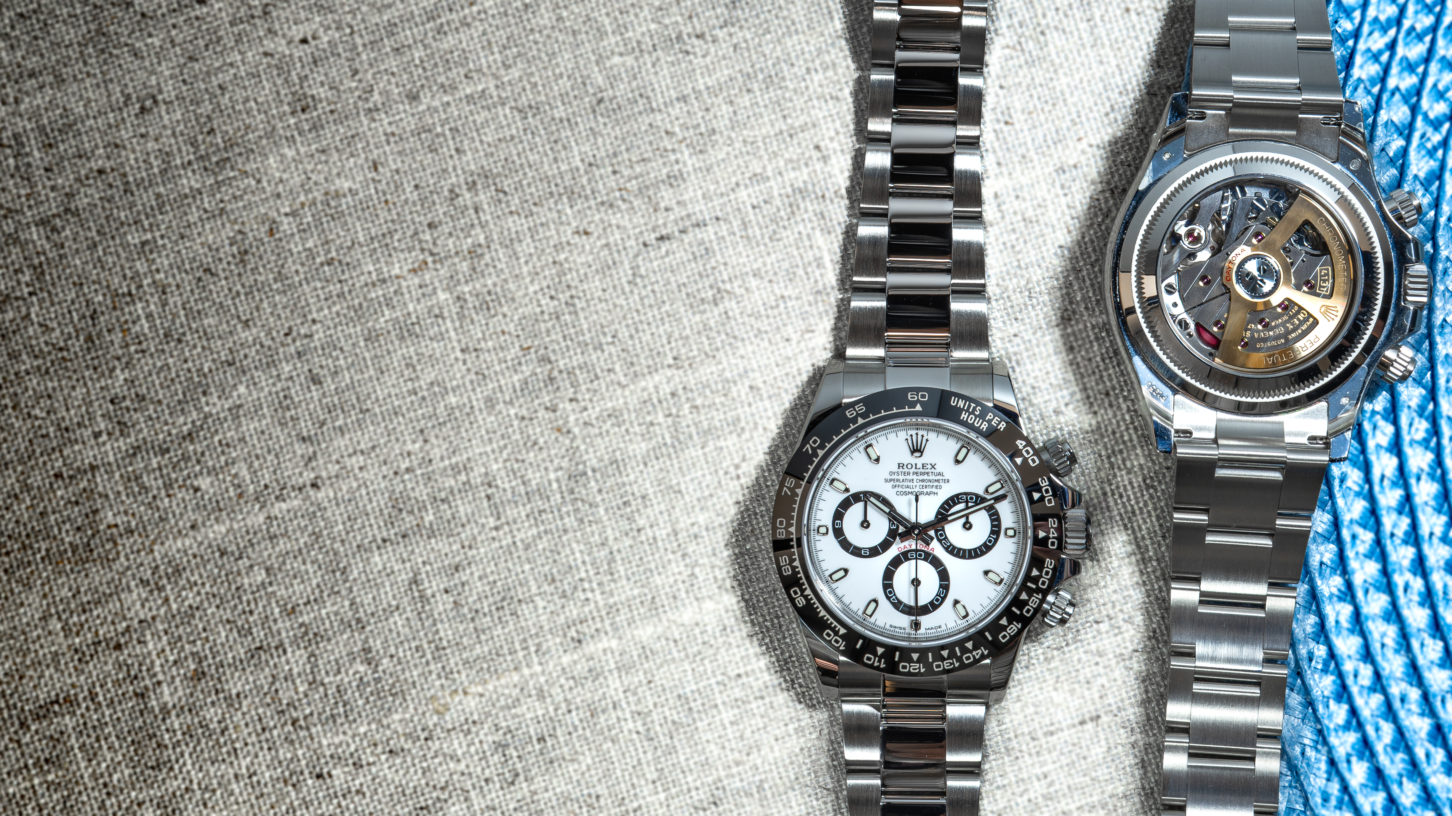 Close-up of a luxury watch, front and caseback